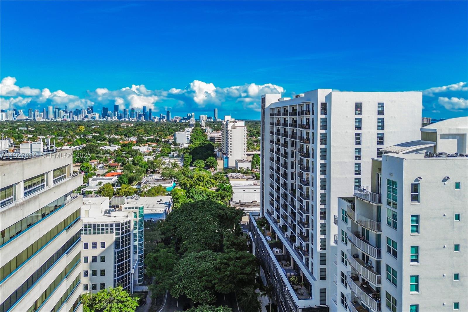 3180 Southwest 22nd Terrace, Unit PH201 Miami, FL 33145 - Photo 43 of 58 a view of a city with tall buildings