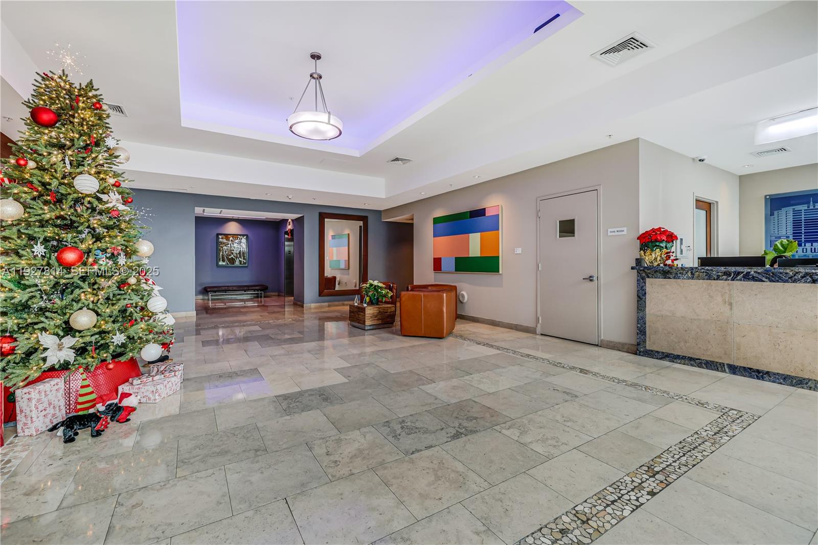 3180 Southwest 22nd Terrace, Unit PH201 Miami, FL 33145 - Photo 58 of 58 a living room with furniture and flowers