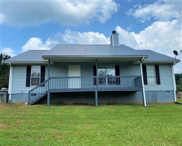 990 Providence Road Roopville, GA 30170 - Photo 1 of 1 a view of a house with a garden