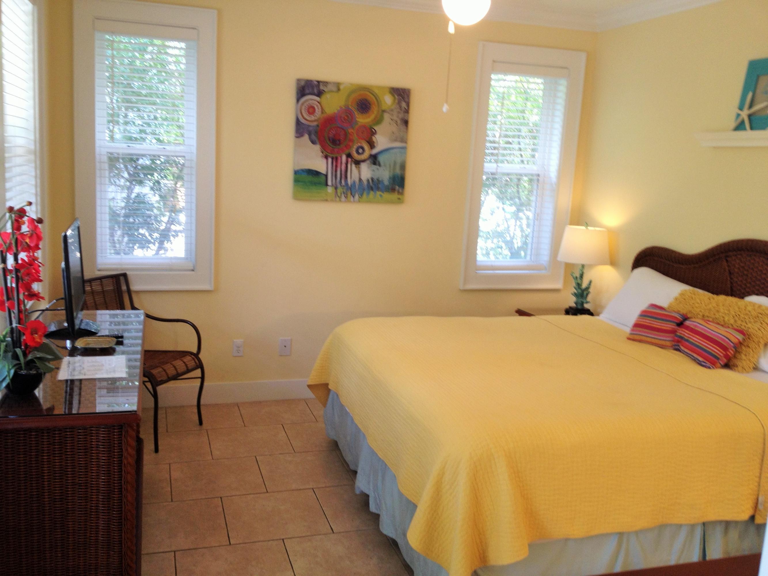 89 West Blue Crab Loop Inlet Beach Inlet Beach, FL 32461 - Photo 12 of 42 a bedroom with a bed and furniture with window