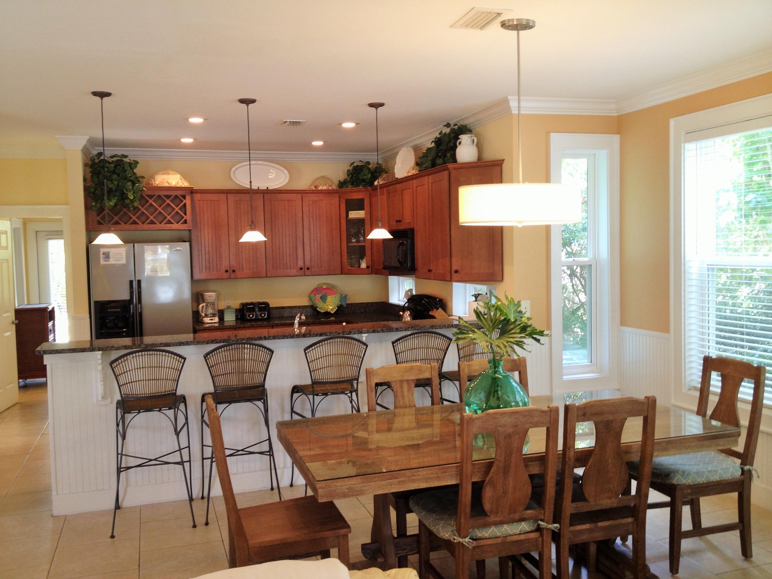 89 West Blue Crab Loop Inlet Beach Inlet Beach, FL 32461 - Photo 18 of 42 a view of a dining room with furniture window and wooden floor