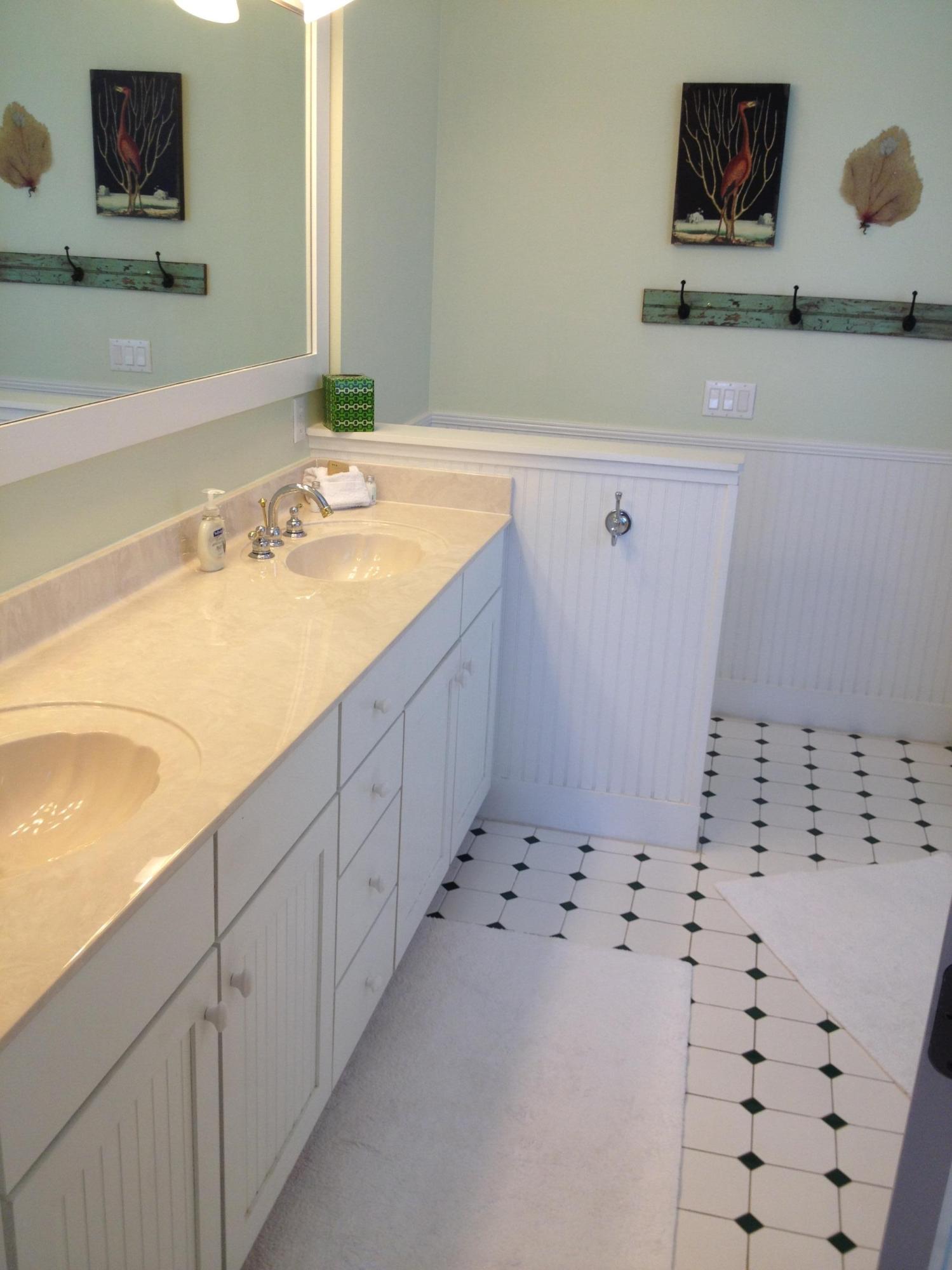 89 West Blue Crab Loop Inlet Beach Inlet Beach, FL 32461 - Photo 27 of 42 a bathroom with a sink and a mirror
