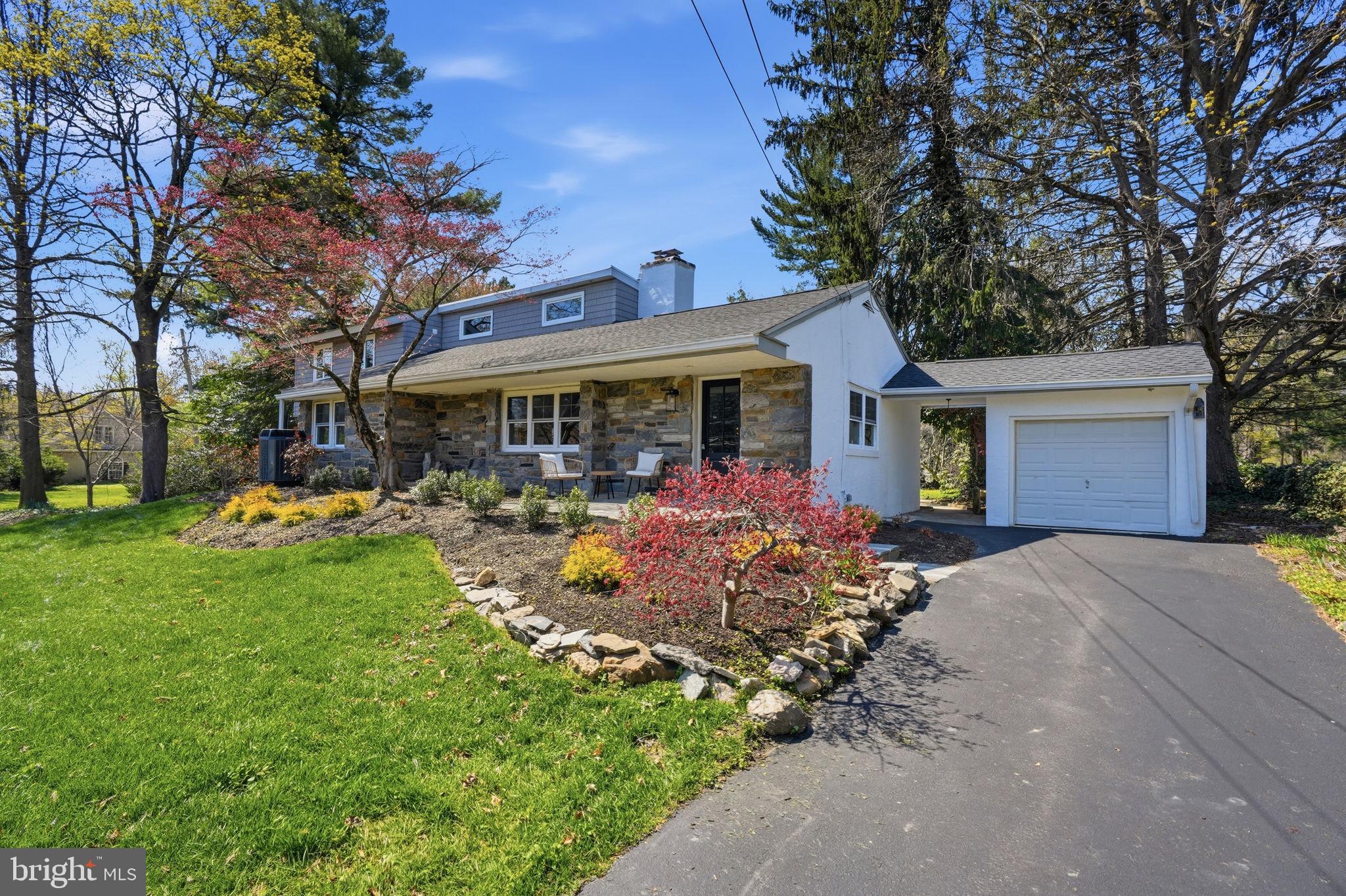 409 South Providence Road Wallingford, PA 19086 - Photo 2 of 106 Charming home with lush landscaping.