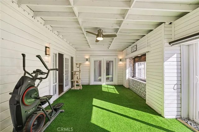 a view of a porch with furniture