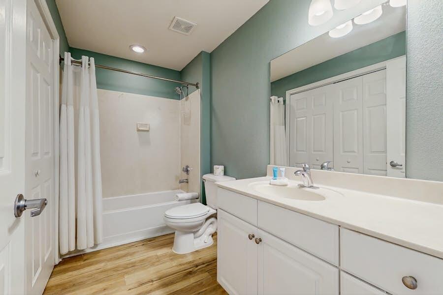 16819 Front Beach Road, Unit 602 Panama City Beach, FL 32413 - Photo 20 of 53 a bathroom with a sink toilet and shower