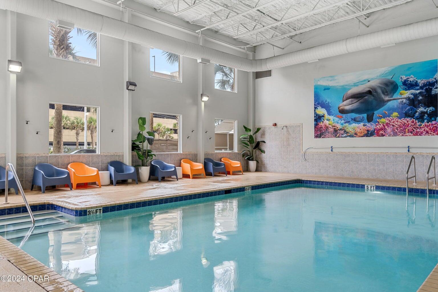 16819 Front Beach Road, Unit 602 Panama City Beach, FL 32413 - Photo 26 of 53 a view of a living room and dining room