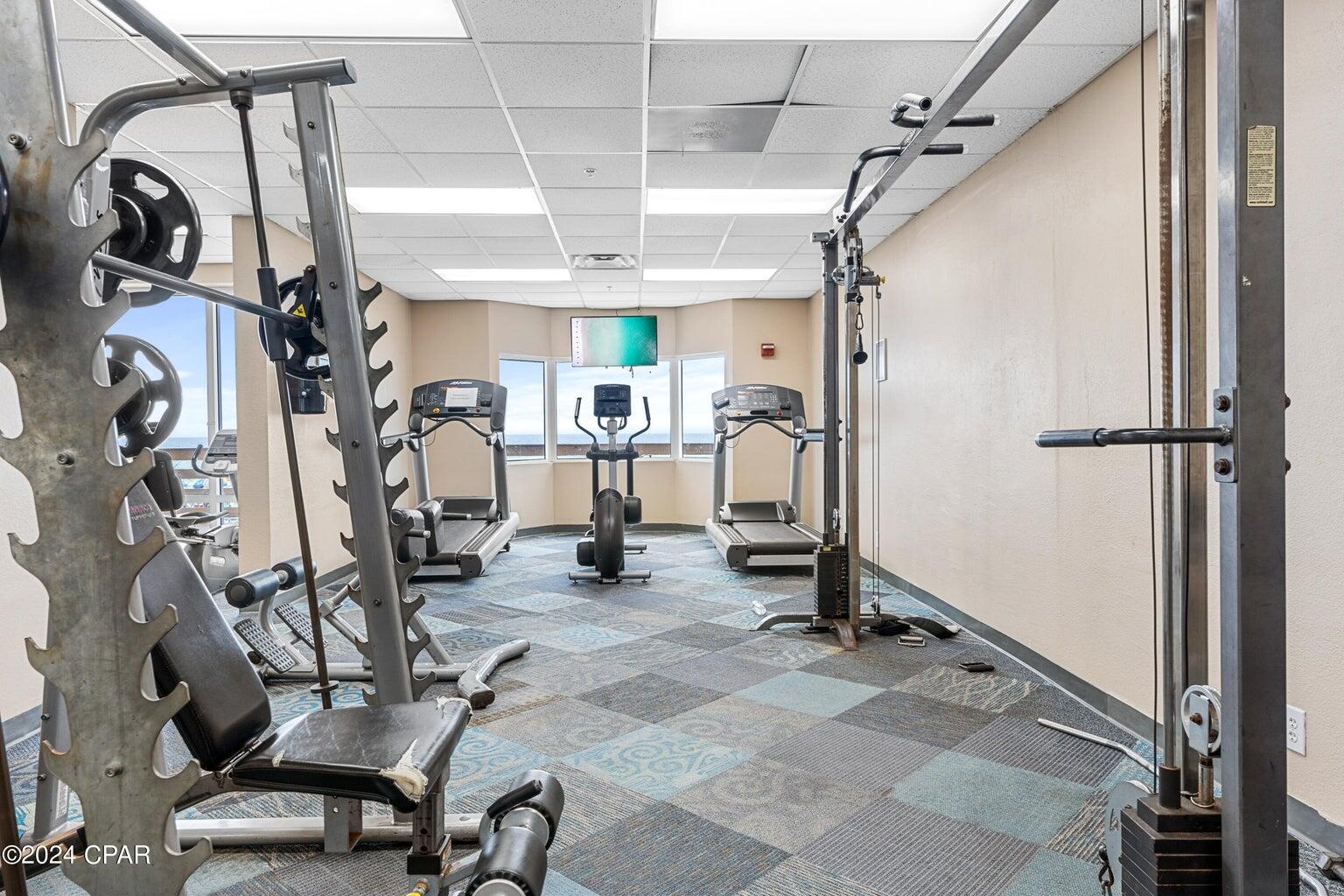 16819 Front Beach Road, Unit 602 Panama City Beach, FL 32413 - Photo 30 of 53 a view of a room with gym equipment