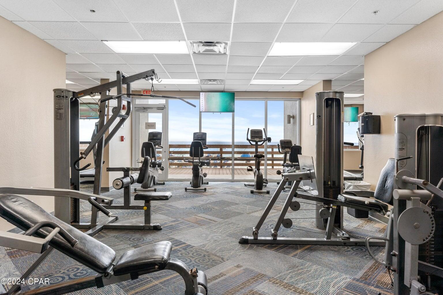 16819 Front Beach Road, Unit 602 Panama City Beach, FL 32413 - Photo 32 of 53 a view of a room with gym equipment