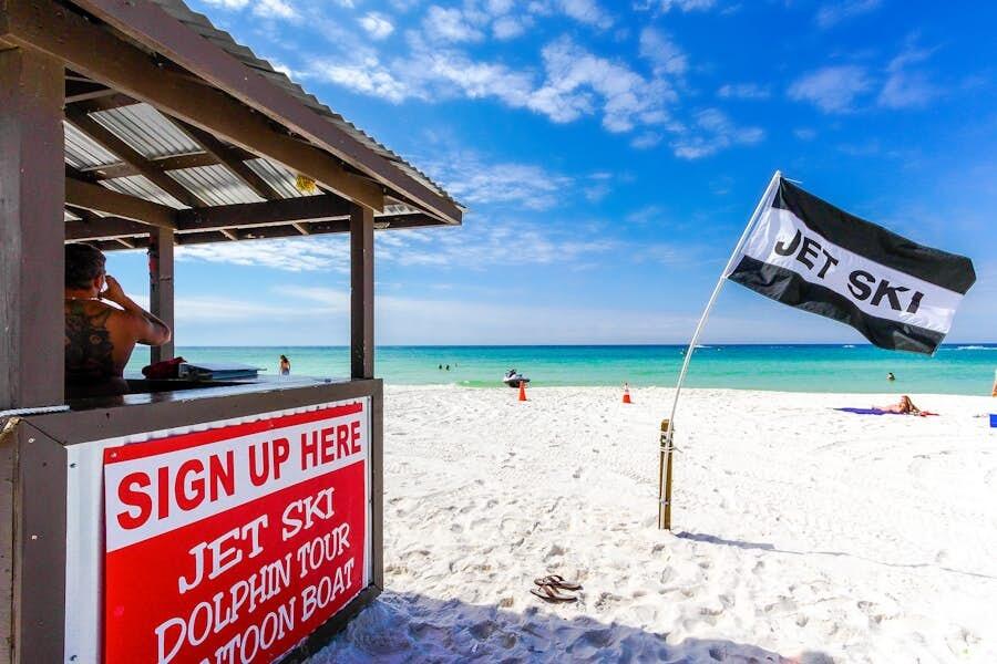 16819 Front Beach Road, Unit 602 Panama City Beach, FL 32413 - Photo 39 of 53 a street sign on a street next to a building