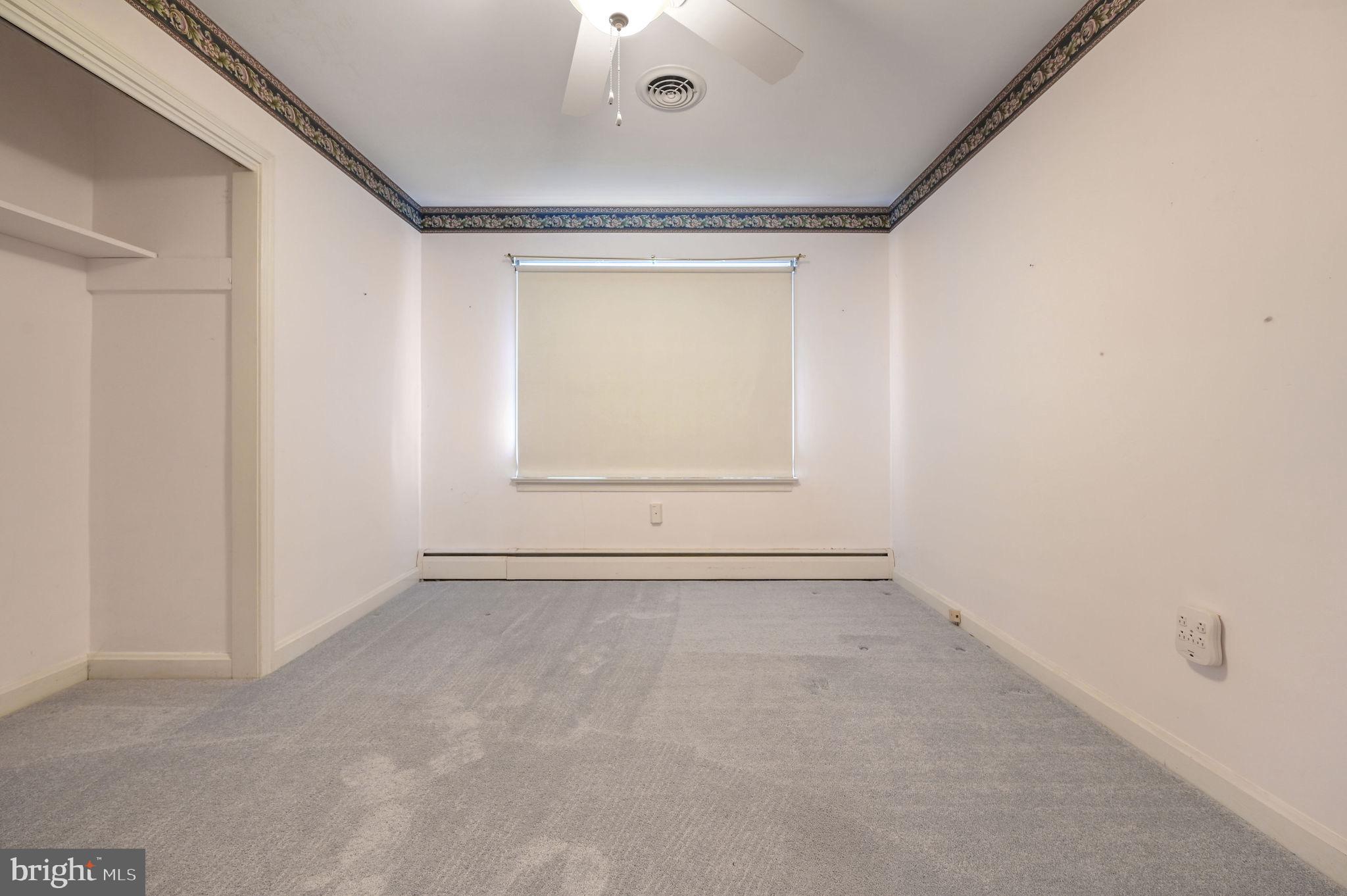 55 Boyd Circle Dover, DE 19901 - Photo 16 of 24 an empty room with a window