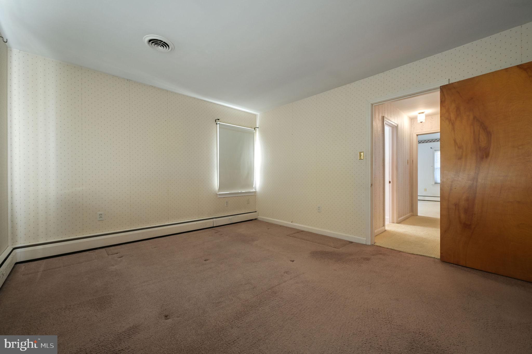 55 Boyd Circle Dover, DE 19901 - Photo 19 of 24 a view of an empty room with a window