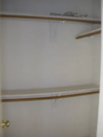 a house that has a tree in front of it