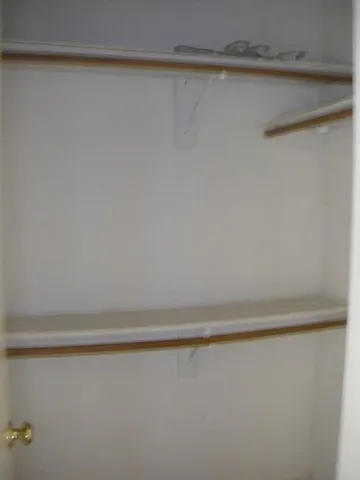 a house that has a tree in front of it