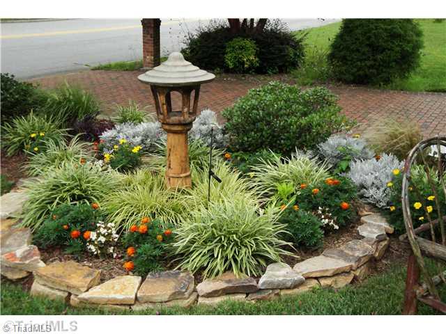 706 Rockspring Road High Point, NC 27262 - Photo 14 of 16 Landscaping. Everywhere you look, there is something beautiful to behold!