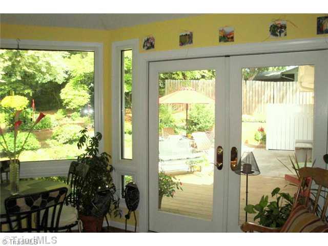 706 Rockspring Road High Point, NC 27262 - Photo 9 of 16 Sunroom. French doors lead to the deck and patio...this room has its own heat and cooling system