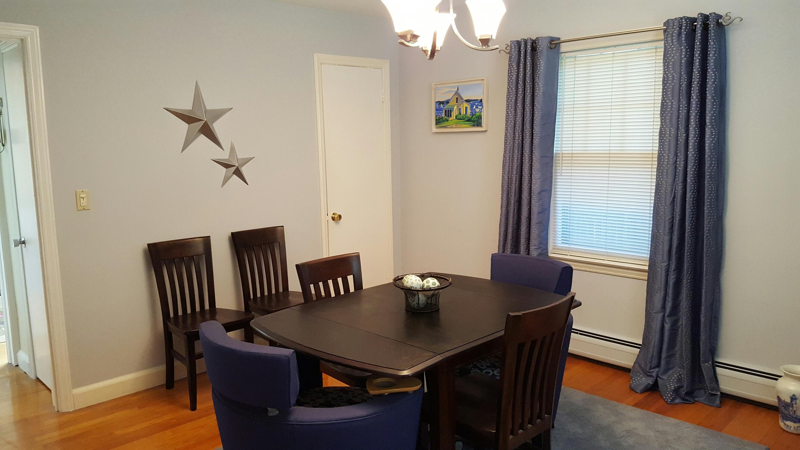 1695 Boston Post Road Darien, CT 06820 - Photo 8 of 20 a view of a dining room with furniture and wooden floor