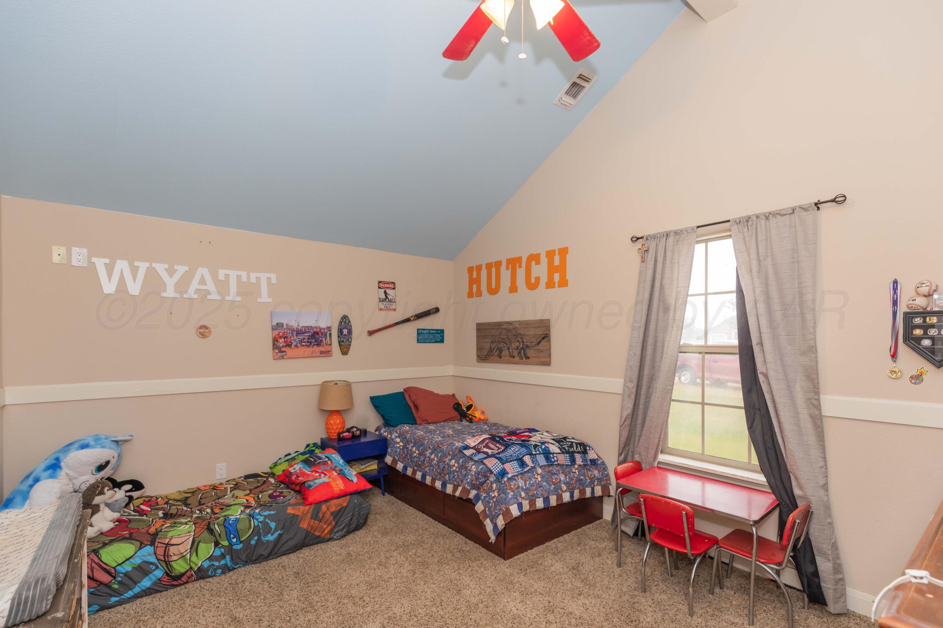 1301 Moon Ridge Lane Amarillo, TX 79124 - Photo 27 of 34 a bedroom with baby crib and a window