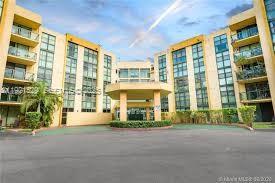 11800 Southwest 18th Street, Unit 4284 Miami, FL 33175 - Photo 1 of 14 a front view of a building with a street