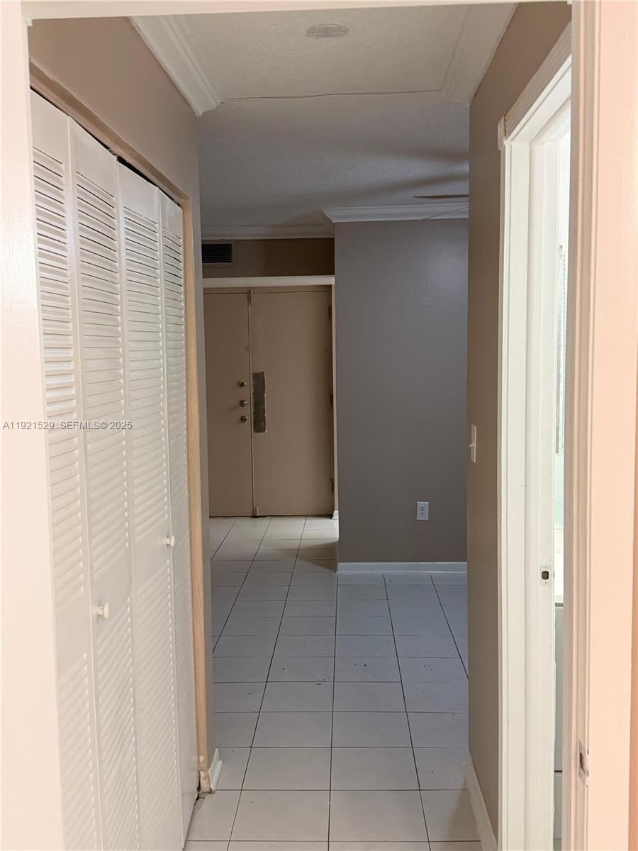 11800 Southwest 18th Street, Unit 4284 Miami, FL 33175 - Photo 11 of 14 a view of an empty room with a window