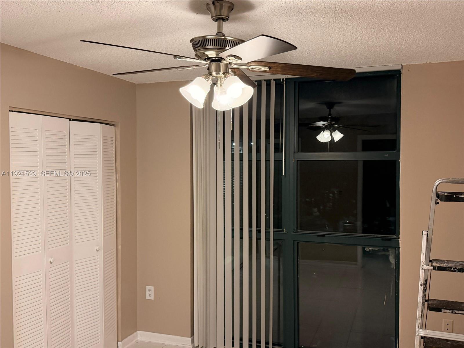 11800 Southwest 18th Street, Unit 4284 Miami, FL 33175 - Photo 12 of 14 a view of a hallway with a chandelier