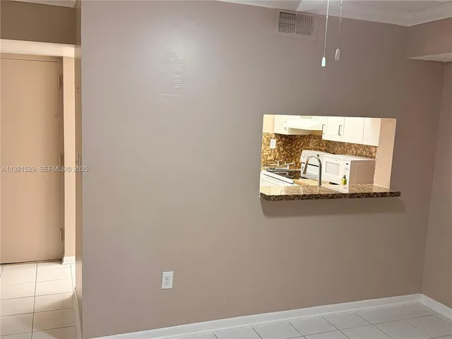 a view of a hallway with a small space