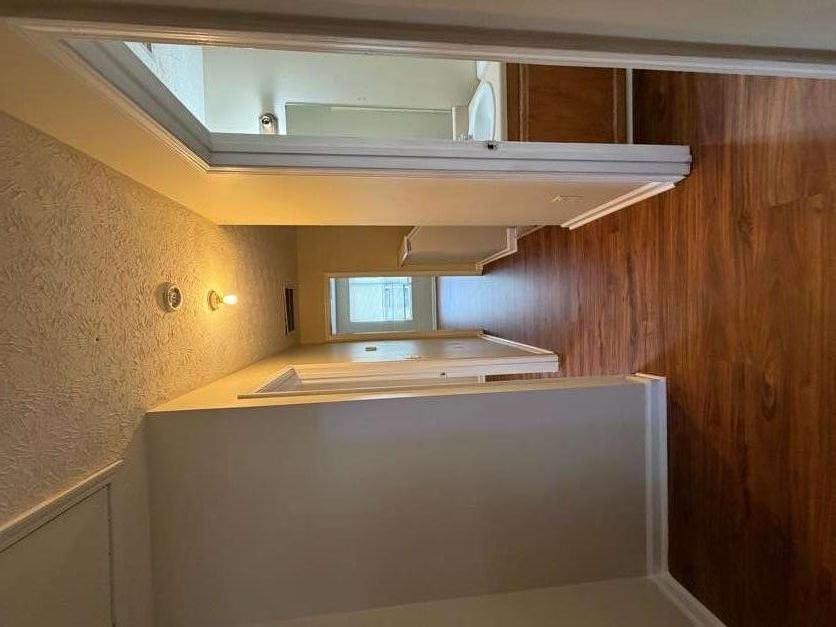 5196 Tew Lane Southwest Covington, GA 30014 - Photo 35 of 41 a view of a hallway with wooden floor