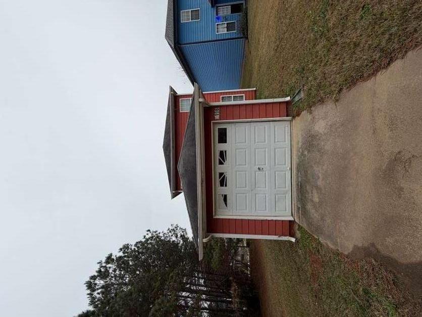 5196 Tew Lane Southwest Covington, GA 30014 - Photo 41 of 41 a house view with a outdoor space