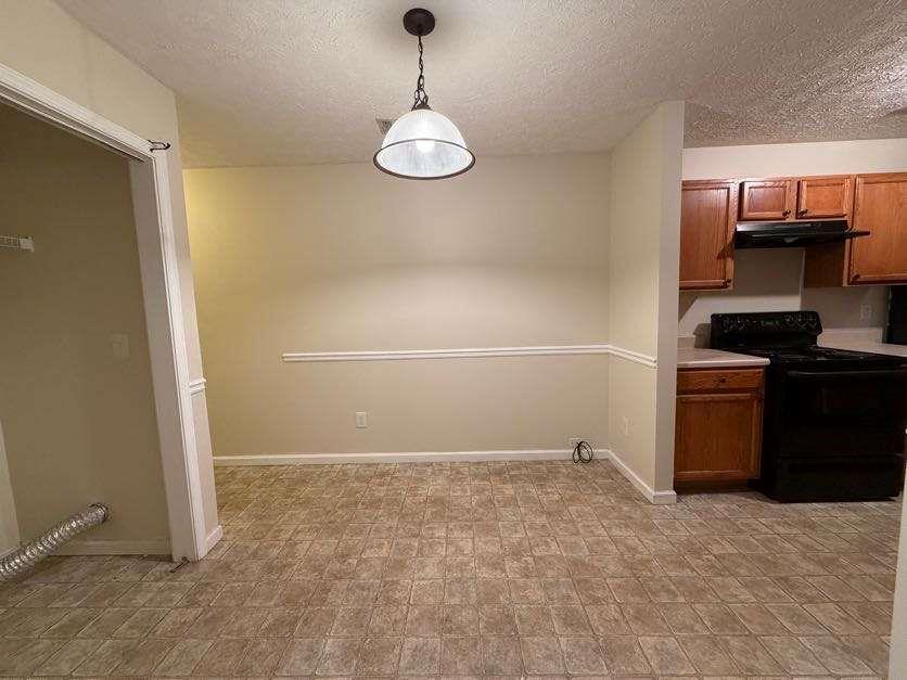5196 Tew Lane Southwest Covington, GA 30014 - Photo 5 of 41 a view of a kitchen with a sink