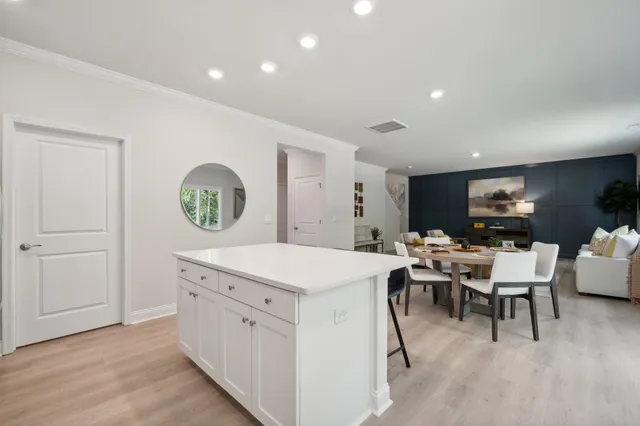 a view of a kitchen and dining room