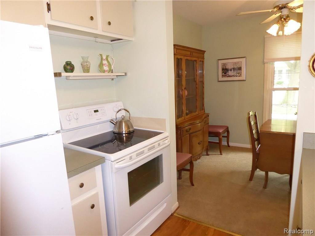 1199 South Sheldon Road, Unit L86 Plymouth, MI 48170 - Photo 13 of 38 New Stove & Refrigerator