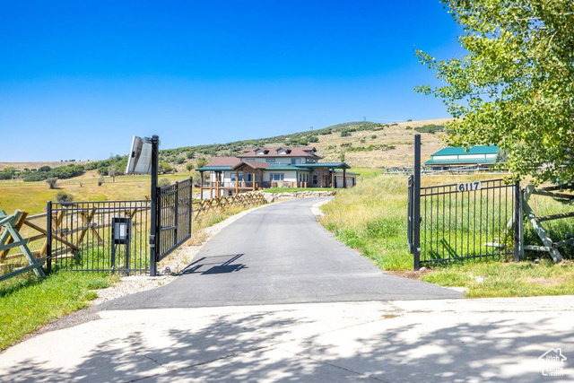 6117 North Rocky Ridge Road Peoa, UT 84061 - Photo 4 of 83 View of road featuring a rural view