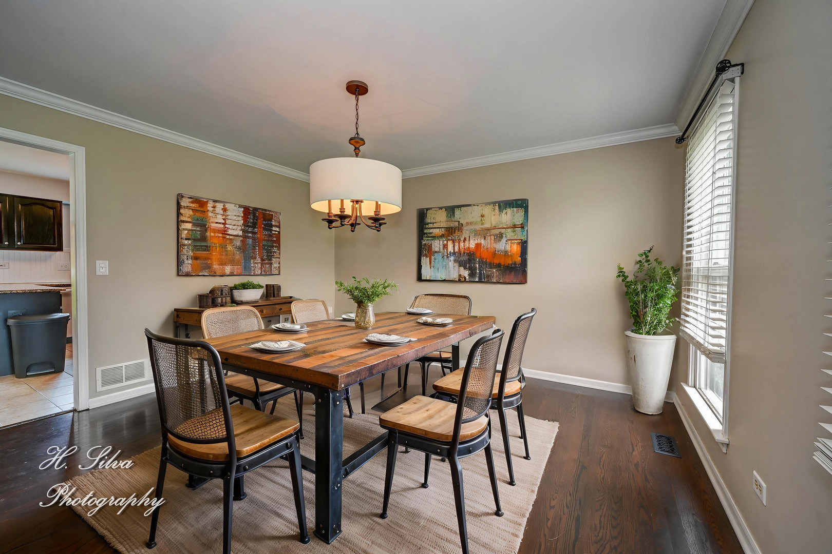3670 Persimmon Drive Algonquin, IL 60102 - Photo 3 of 13 a view of a dining room with furniture and wooden floor