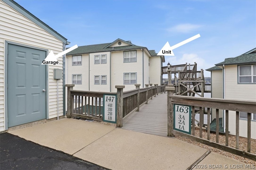 147 Evergreen Road, Unit 4B Sunrise Beach, MO 65079 - Photo 10 of 49 Garage is right in front of unit!