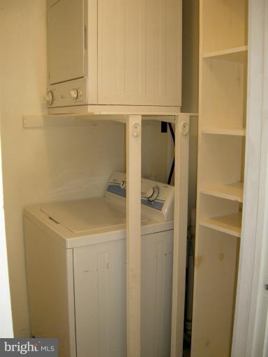 52 Ridge Road, Unit A Greenbelt, MD 20770 - Photo 2 of 22 a utility room with dryer and washer