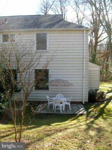 52 Ridge Road, Unit A Greenbelt, MD 20770 - Photo 10 of 22 a view of a house with a yard