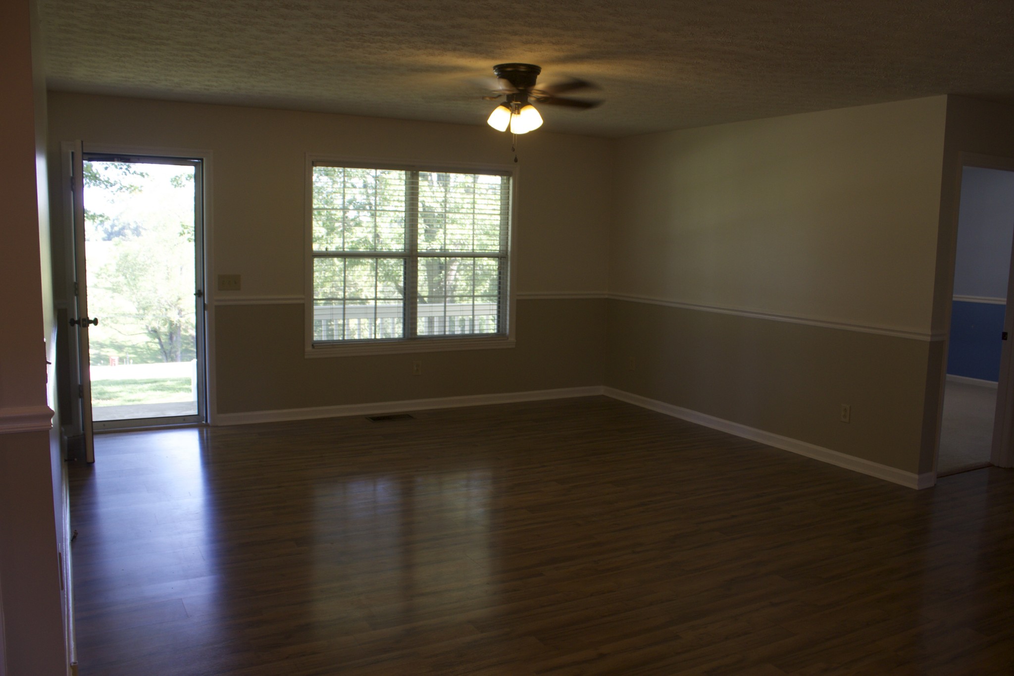247 Patterson Road Lafayette, TN 37083 - Photo 14 of 37 wooden floor in an empty room with a window