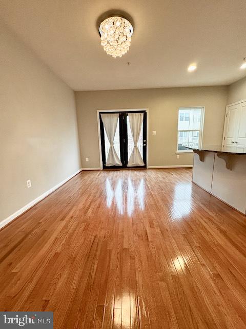 3542 Sprigg Street South Frederick, MD 21704 - Photo 13 of 34 wooden floor in an empty room with a window