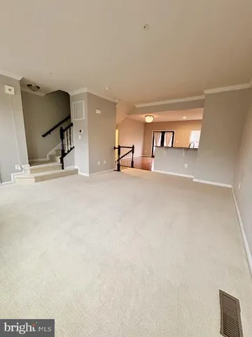 a view of a livingroom and a window
