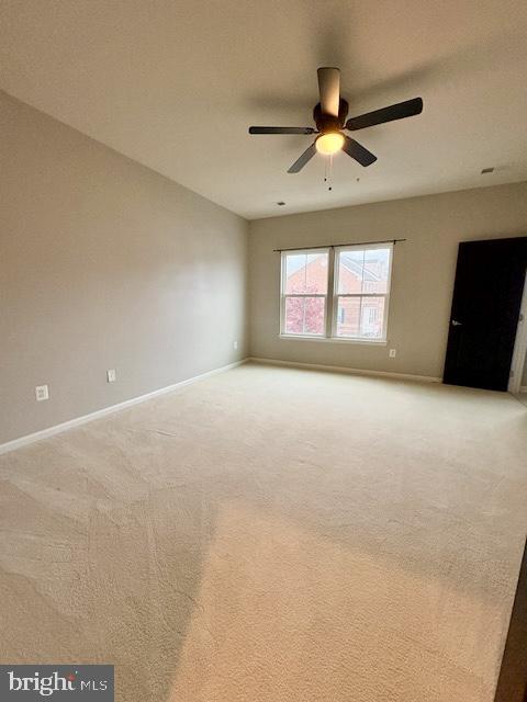 3542 Sprigg Street South Frederick, MD 21704 - Photo 19 of 34 an empty room with windows and ceiling fan