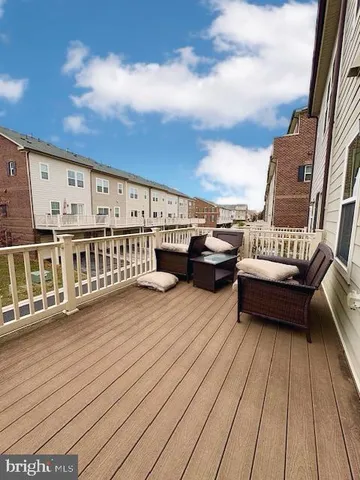 a view of a balcony with lounge chair