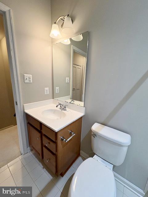 3542 Sprigg Street South Frederick, MD 21704 - Photo 32 of 34 a bathroom with a sink a toilet a mirror and vanity