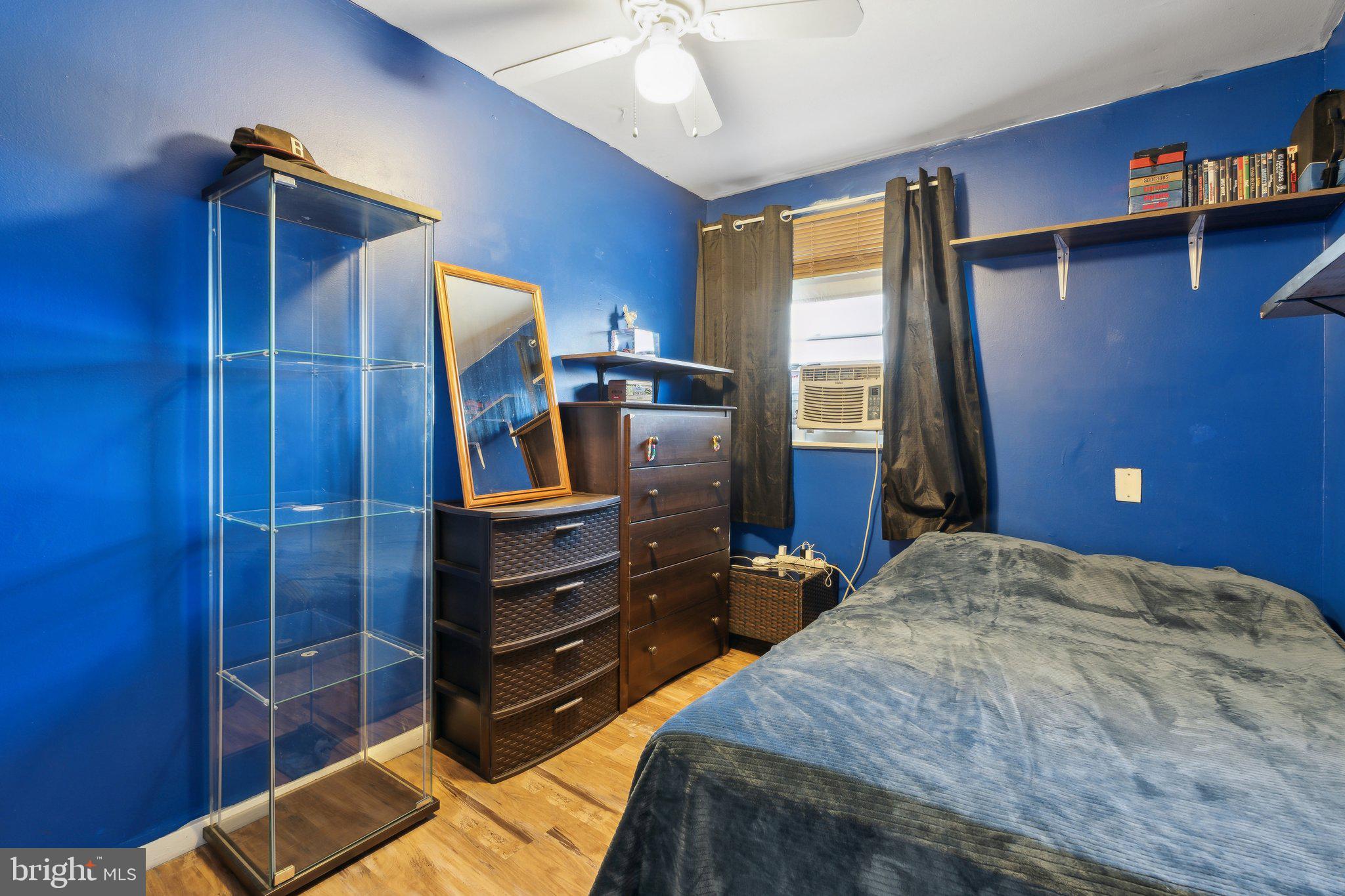 175 Seagull Drive Pasadena, MD 21122 - Photo 16 of 23 a bedroom with a bed and a closet