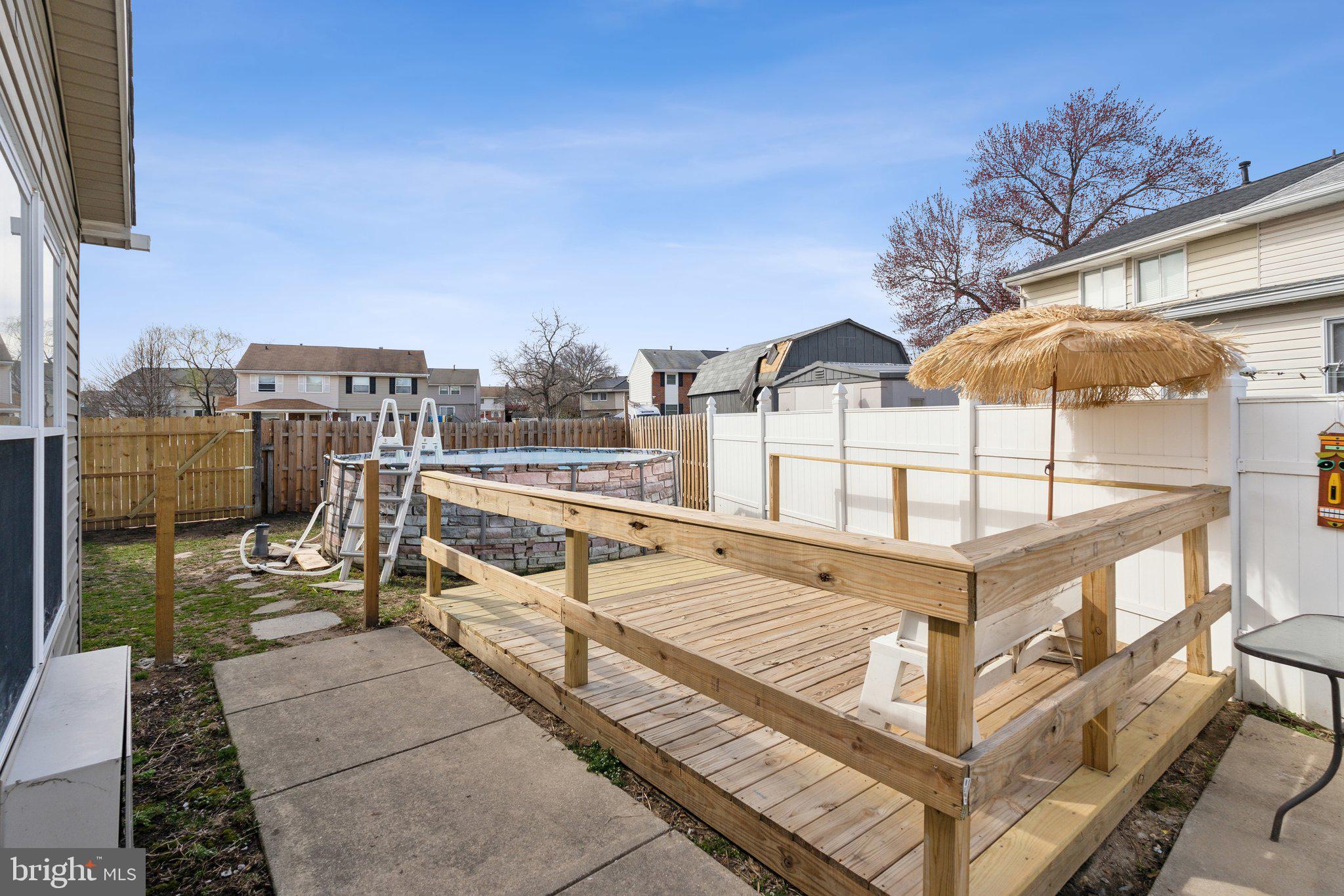 175 Seagull Drive Pasadena, MD 21122 - Photo 22 of 23 a view of a balcony with chairs