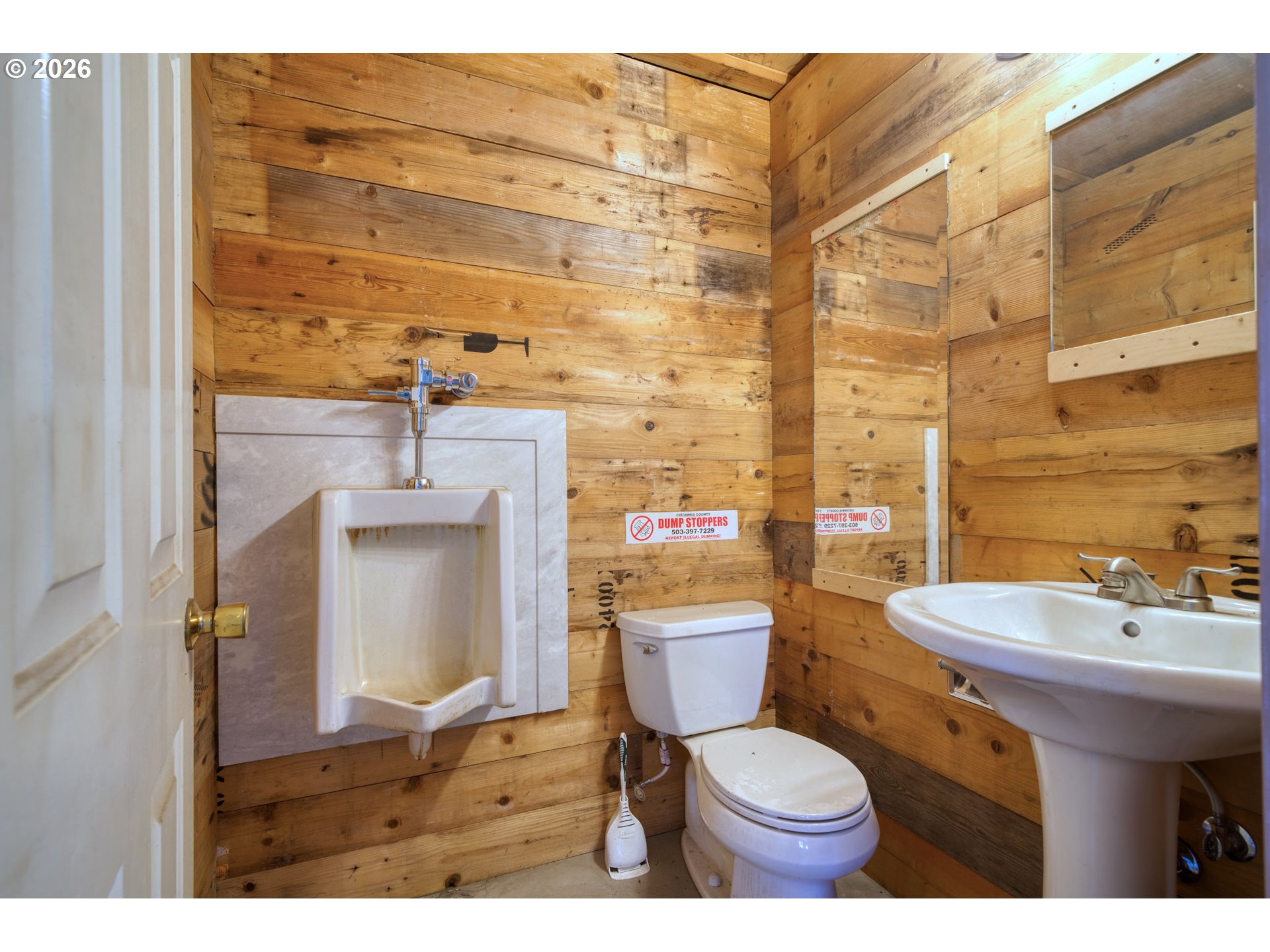 33058 Church Road Warren, OR 97053 - Photo 37 of 45 a bathroom with a toilet sink and mirror