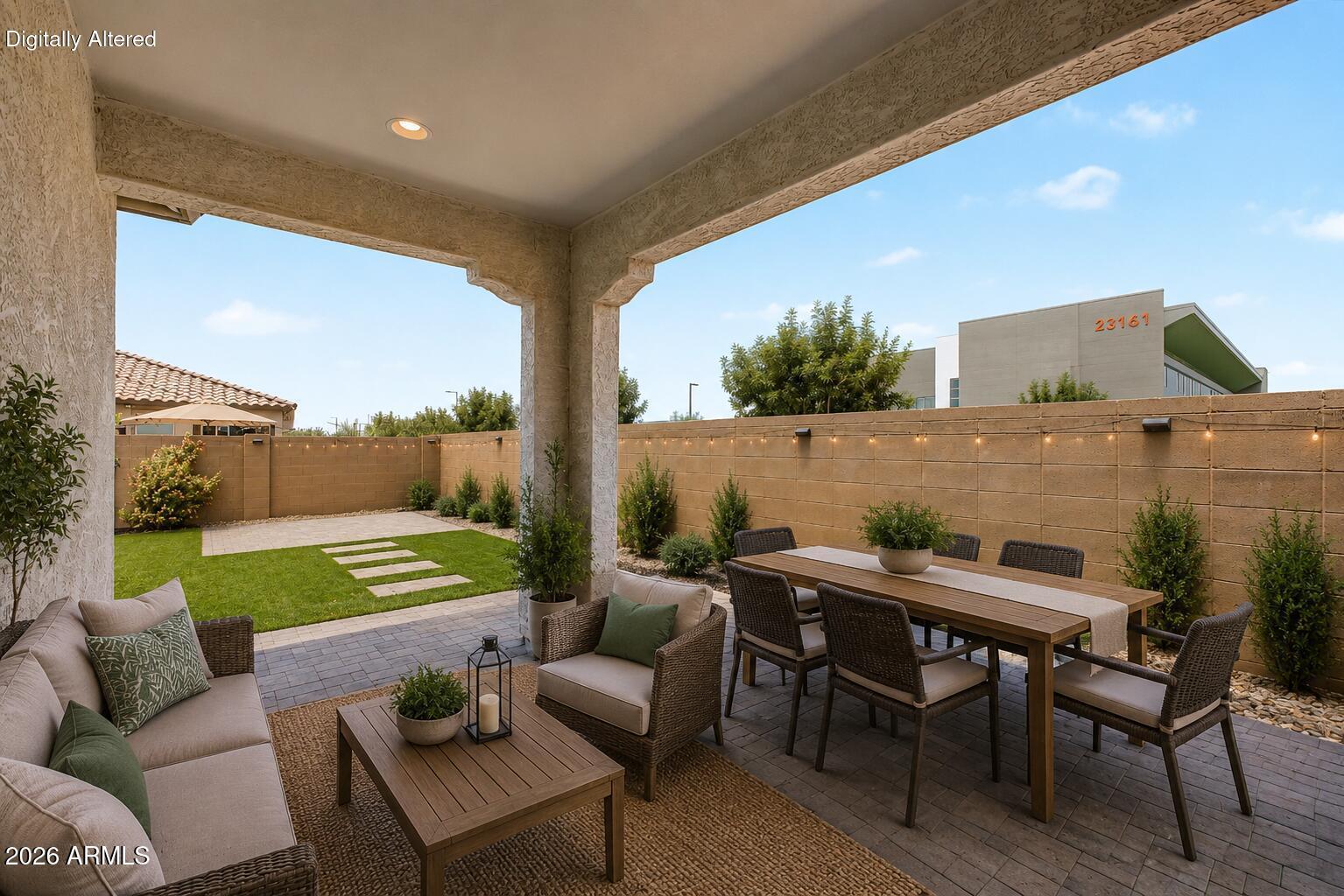 23080 East Stacey Road Queen Creek, AZ 85142 - Photo 38 of 42 a view of an outdoor sitting area with furniture and a floor to ceiling window