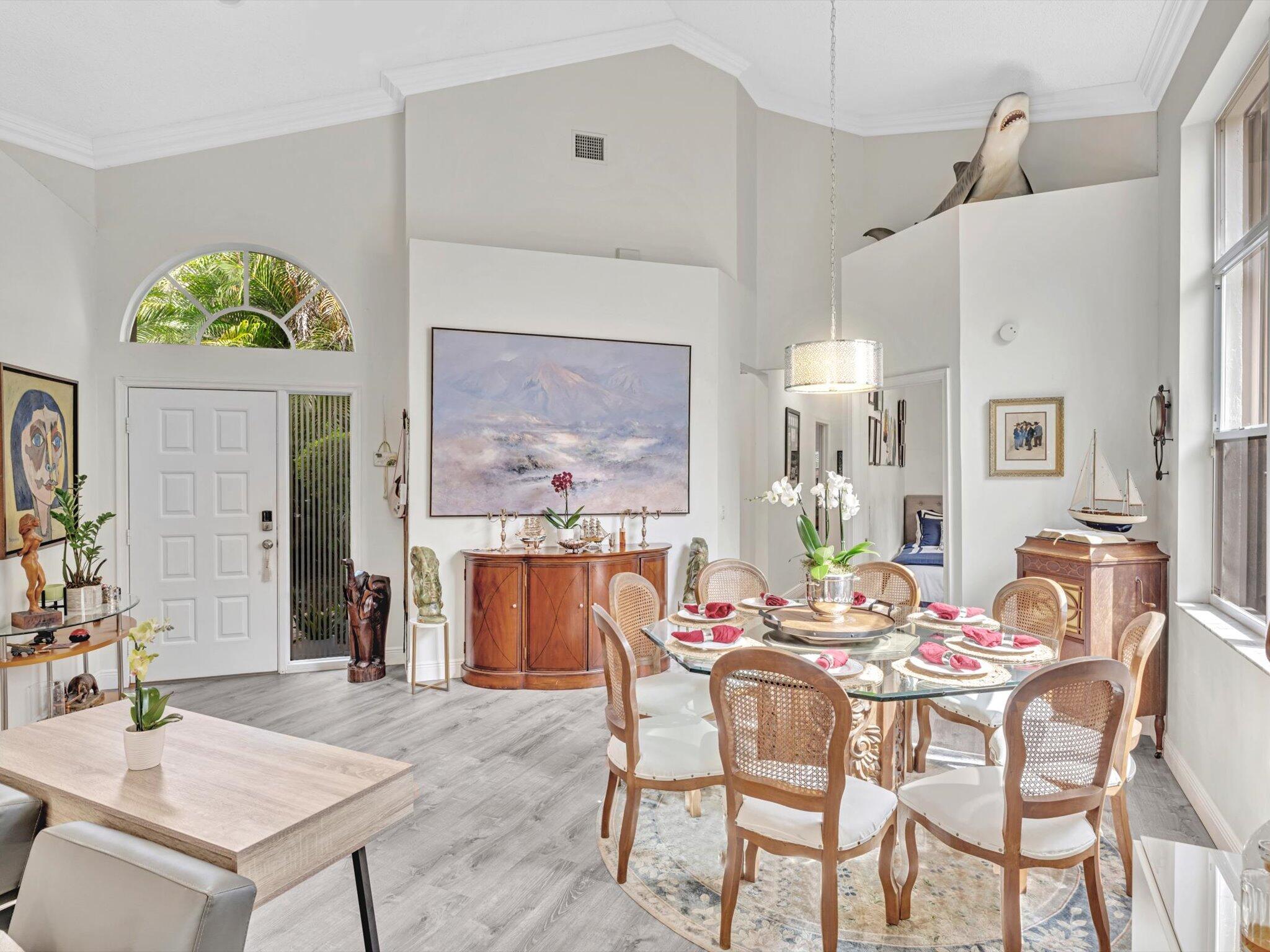 2486 Northwest 66th Drive Boca Raton, FL 33496 - Photo 20 of 80 a dining room with furniture and window