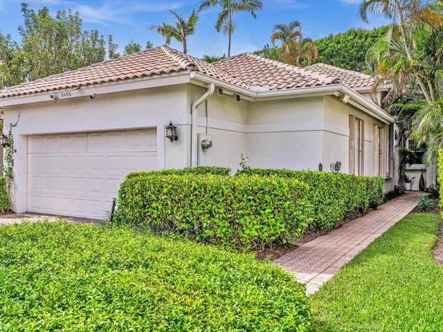 a view of a house with a garden
