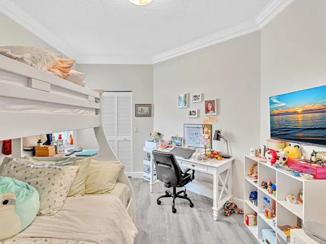 a kitchen with a sink cabinets and window