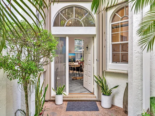 a front view of a house with a porch