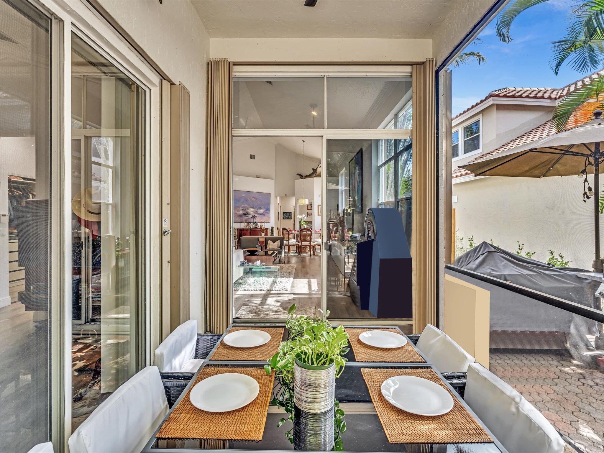2486 Northwest 66th Drive Boca Raton, FL 33496 - Photo 33 of 80 a room with furniture and wooden floor